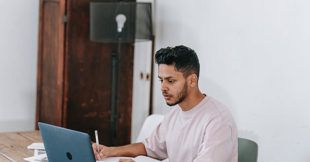 Student studying for exam at home