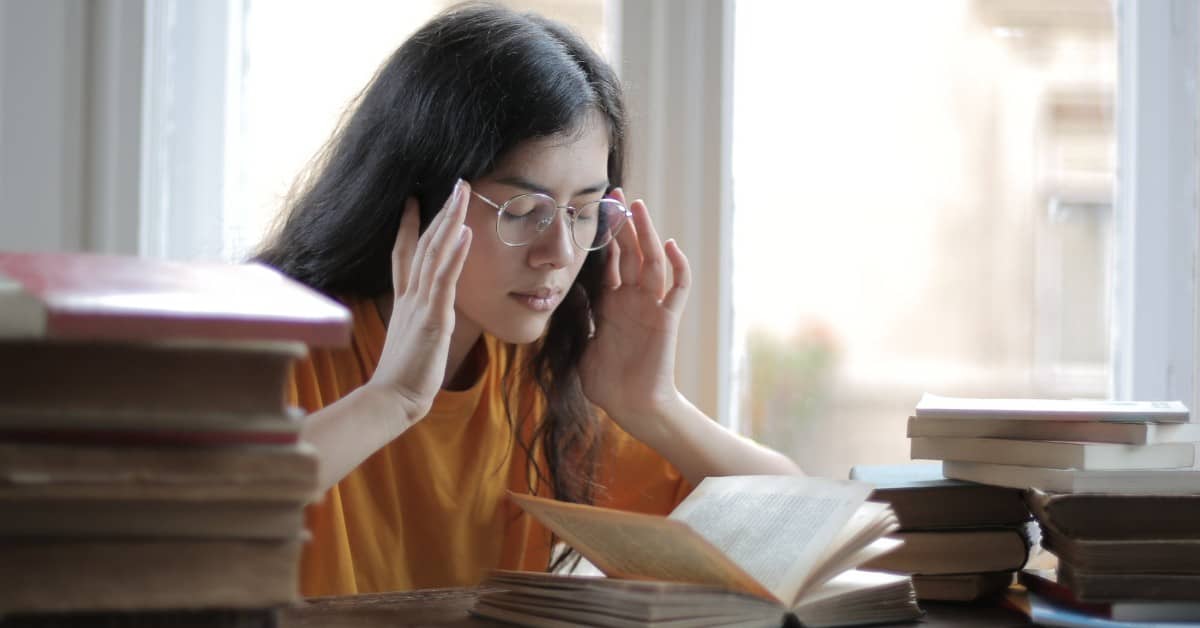 female student studying hard to improve her LSAT score