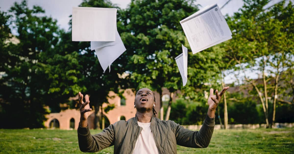 law student throws up papers in the air as he aced the lsat
