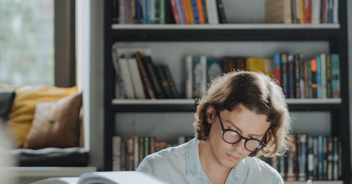 Man studying in a library