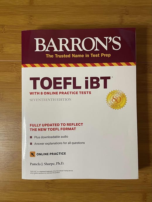 Barron's TOEFL iBT with 8 online practice tests, 17th Edition on a table