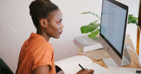 young lady studying on the computer
