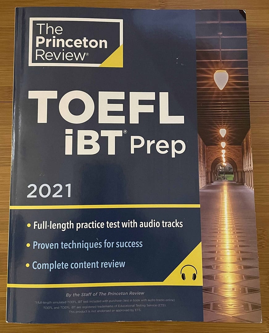 TOEFL iBT Prep 2021 by The Princeton Review on a table